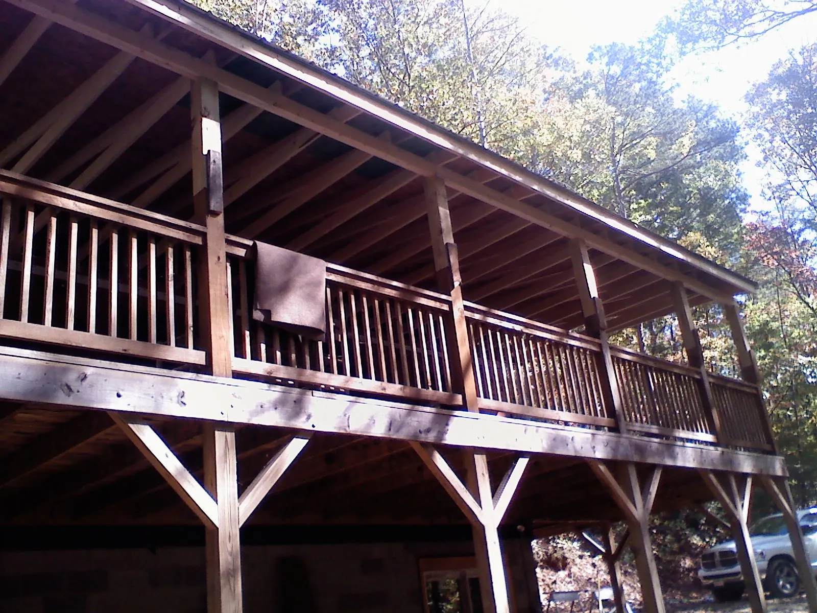 Timber framing under a new elevated porch and deck — Roof Leak Repair in Fitchburg by Roofing Brothers